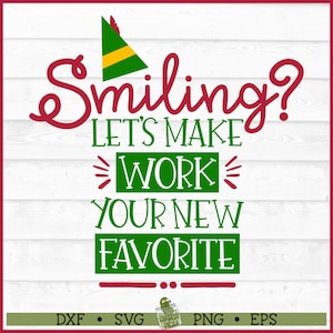 May include: Smiling? Let's make work your new favourite. Green and red text on a white wood background with a green elf hat at the top.
