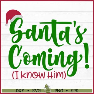 May include: Green text on a white wood background reads "Santa's Coming! (I know him)".  A red Santa hat with white trim is in the top left corner.