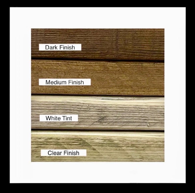 May include: A close-up of four wood samples with different finishes. The top sample is a dark brown, followed by a medium brown, a light white tint, and a clear finish. Each sample has a label indicating the finish type.