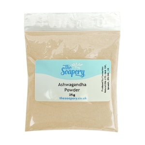 May include: A transparent bag containing 25g of ashwagandha powder. The label features the text "the Soapery" and "Ashwagandha Powder". The website thesoapery.co.uk is also printed on the label. The bag is sealed.