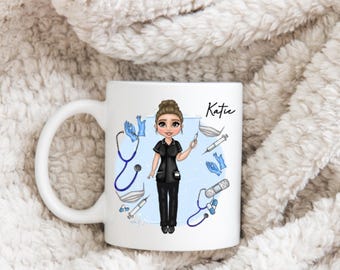 May include: White ceramic mug featuring a cartoon illustration of a nurse in black scrubs, holding a syringe. The mug includes medical tools like a stethoscope, gloves, and a face mask. The name "Katie" is written on the mug.