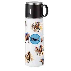 May include: White stainless steel water bottle with a black lid and handle. The bottle has a watercolor design of horses and jockeys racing. The word "Dad" is printed in black on a blue circle.