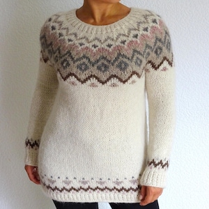 This sweater has my own design - ConexosStudio Design 2019
And I have named it White Earth sweater.
Fair isle knit yoke pullover is made using pastel color tones.
**** Color: Natural off white, Rose-mist, Gray, Beige, Brown

A hand knitted Icelandic or Nordic pattern alpaca wool sweater is very warm, soft and pleasant to the skin.
Hand knitted improvisation of famous Fair isle/ Scandinavian pattern sweater.
This knitwear is easy to fluff.