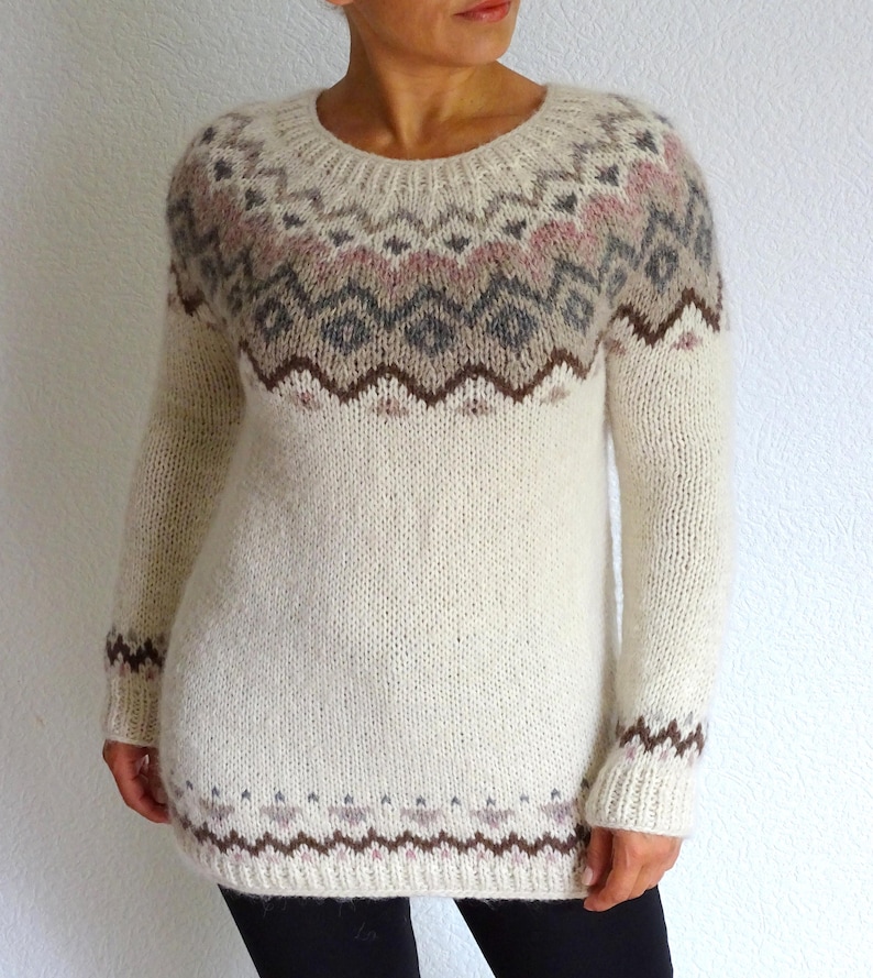 This sweater has my own design - ConexosStudio Design 2019
And I have named it White Earth sweater.
Fair isle knit yoke pullover is made using pastel color tones.
**** Color: Natural off white, Rose-mist, Gray, Beige, Brown

A hand knitted Icelandic or Nordic pattern alpaca wool sweater is very warm, soft and pleasant to the skin.
Hand knitted improvisation of famous Fair isle/ Scandinavian pattern sweater.
This knitwear is easy to fluff.