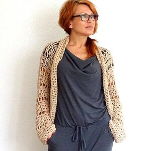 ✨ Features:
• 100% hand-crocheted
• Lightweight and breathable
• Neutral beige tone
• Open mesh stitch design
• Oversized, slouchy fit
• Perfect for layering or as a cover-up