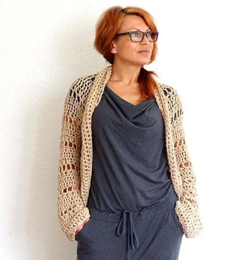 ✨ Features:
• 100% hand-crocheted
• Lightweight and breathable
• Neutral beige tone
• Open mesh stitch design
• Oversized, slouchy fit
• Perfect for layering or as a cover-up