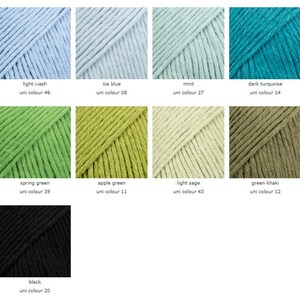 May include: Yarn samples in various colors, including light wash, ice blue, mint, dark turquoise, spring green, apple green, light sage, green khaki, and black. Each sample is labeled with the color name and uni color number.