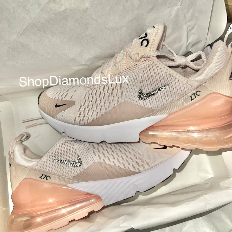 blush color nike shoes