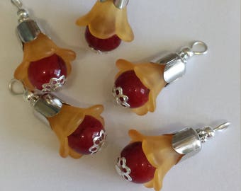 5 orange lucite flower charms + Red/Black 8mm glass Pearl