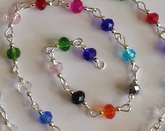 55cm of string/washers 6mm multicolored glass beads