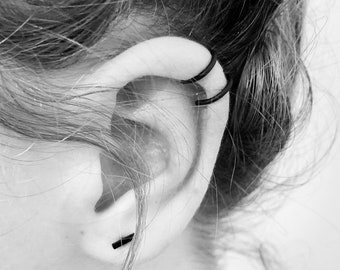 Black ear cuff. No piercing. Available in 6 styles :-)