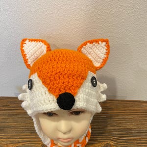 Chapeau à oreillettes en forme de renard