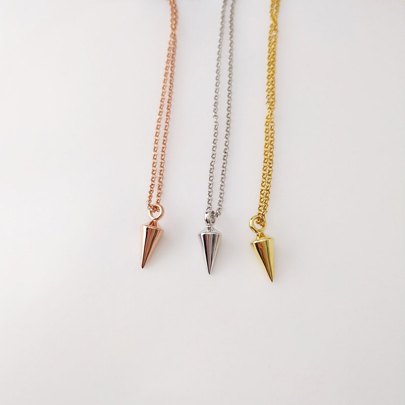 Spike total length (include the bail) is approximately 14,5 mm