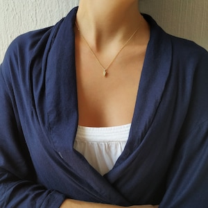 women wears 9k yellow gold solid spike necklace