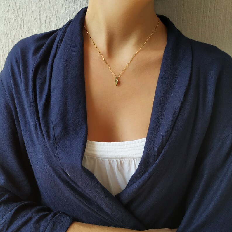 women wears 9k yellow gold solid spike necklace