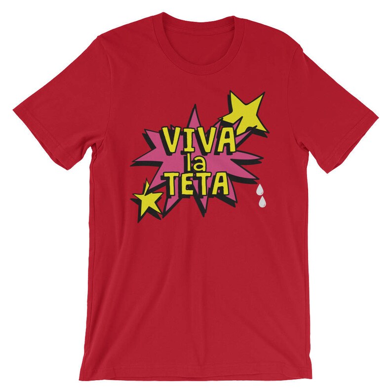 May include: Red t-shirt with a pink and yellow graphic that says "Viva la Teta" with two white teardrop shapes.