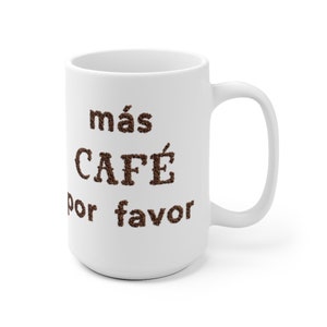 May include: White ceramic coffee mug with the text "más CAFÉ por favor" in brown coffee beans.