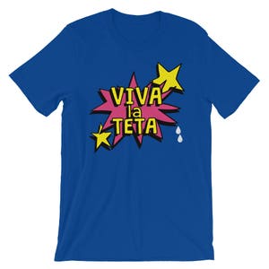 May include: A royal blue t-shirt with a pink and yellow graphic that says "Viva la Teta" with two white teardrop shapes.