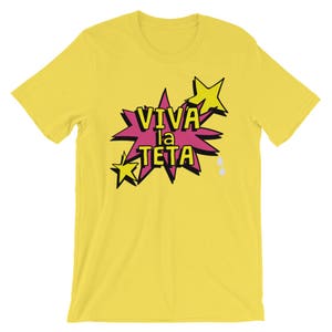 May include: Yellow short-sleeved t-shirt with a pink and yellow graphic that says "Viva la Teta" with two yellow stars and two white teardrops.