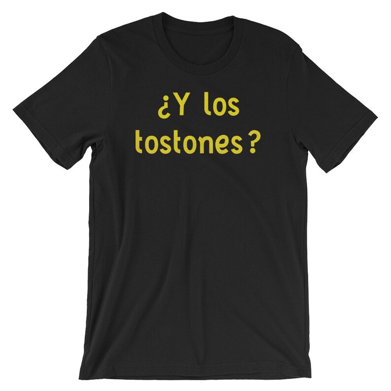 May include: Black t-shirt with the text "&iquest;Y los tostones?" in yellow.