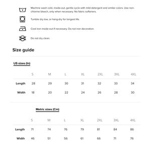 May include: White graphic with care instructions and a size guide for apparel. The size guide includes US sizes in inches, with lengths ranging from 28 to 34 inches and widths from 18 to 30 inches. Metric sizes are also provided.