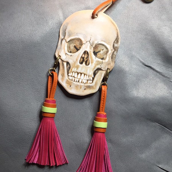 Leather human skull charm with tiny earrings