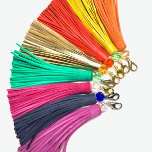 Leather & crystal topped tassel very finely cut with a single faceted bead and small lobster clip wide colour range, ideal stocking filler