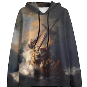 Könnte beinhalten: Ein schwarzer Hoodie mit einem Druck eines berühmten Gemäldes, das ein Schiff in einem Sturm zeigt. Das Gemälde ist im realistischen Stil gehalten mit einem dramatischen Himmel und tosenden Wellen.