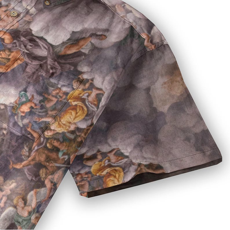 May include: A short-sleeved button-up shirt with a print of a Renaissance-era painting depicting a scene of angels and clouds. The shirt is made of a soft, lightweight fabric and has a relaxed fit.