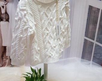 Knitted white baby cotton sweater