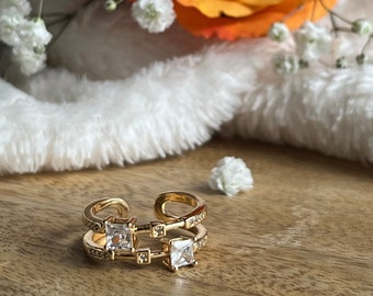 Double ring with zircons set in 24-karat gold-plated brass • ring • rings • zirconium