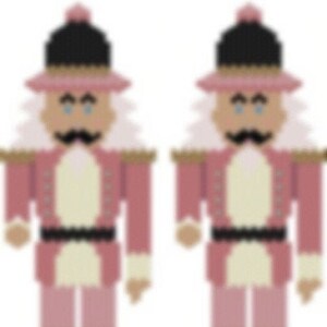 May include: Two pink and white nutcracker figurines with black hats and white fur trim. The nutcrackers are standing on a pink and white base.
