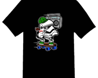 May include: A black t-shirt with a cartoon illustration of a Stormtrooper skateboarding with a boombox on his back. The Stormtrooper is wearing a green hat and holding a red can.