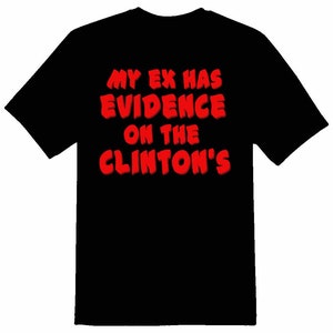私の元夫はクリントンの漫画の面白いユーモアの黒または白のTシャツの証拠を持っています