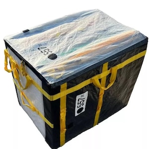 May include: Black and yellow delivery bag with a clear plastic cover. The bag has two handles and a zipper closure. The bag has the number "557" printed on it.