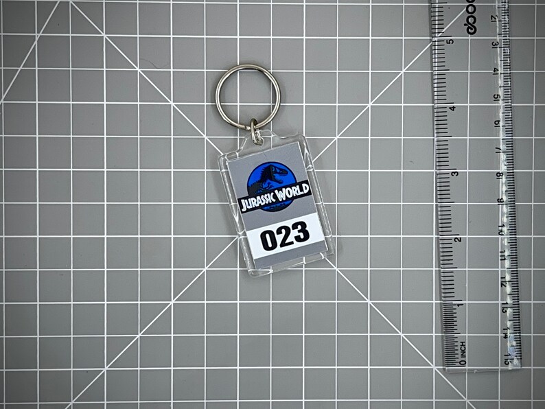 Jurassic World Numbered Keychain Mirror Tag Style Grey