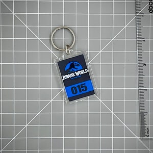 Jurassic World Numbered Keychain Mirror Tag Style Navy