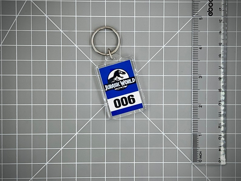 Jurassic World Numbered Keychain Mirror Tag Style Blue