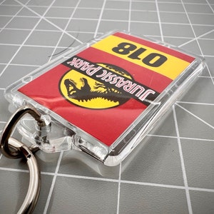 Jurassic Park Numbered Keychain Mirror Tag Style image 2