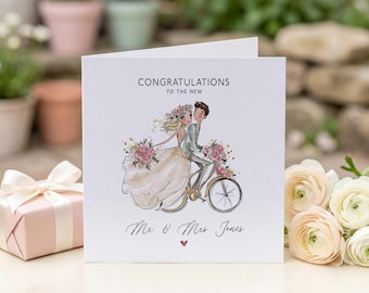 Tarjeta de felicitación personalizada para recién casados con una ilustración de pareja encantadora.