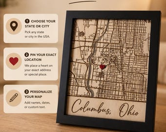 May include: A framed wooden map of Columbus, Ohio, featuring a red heart pin at a specific location. The image includes text: Your Place. Forever on Wood. 1 CHOOSE YOUR STATE OR CITY, 2 PIN YOUR EXACT LOCATION, 3 PERSONALIZE YOUR MAP, Columbus, Ohio.