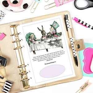 May include: A printable journal page featuring an illustration of Alice in Wonderland characters, the Mad Hatter and the March Hare, having tea. The text reads "When the day becomes the night and the sky becomes the sea..." and "This Journal belongs to".