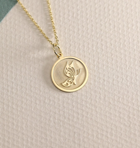 Gouden ketting met vlinder hanger