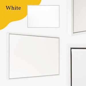 May include: White framed canvas art pieces. The image shows multiple white canvases with white frames. The word "White" is in the upper left corner on a yellow background.