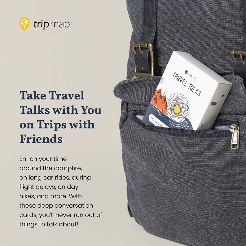 May include: A gray canvas backpack with a zippered pocket containing a box of conversation cards called "Travel Talks" for friends. The box has a colorful illustration of a mountain range, sun, and ocean waves.