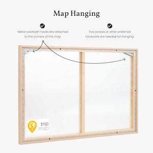 May include: Back of a framed map with wooden frame and metal sawtooth hooks attached to the corners. The text "Map Hanging" is at the top, with instructions on how to hang the map. The logo "trip map" is in the bottom left corner.
