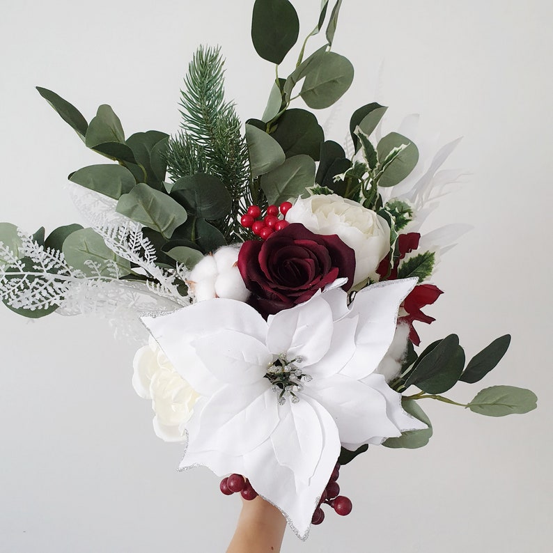 white poinsettia bouquet wedding