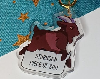 Stubborn piece of shit! goat keychain