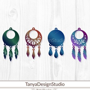 May include: Four decorative earring designs in shades of green, red-brown, blue, and purple. Each design features a circular or semi-circular top with dangling elements, including feathers and teardrop shapes. The designs are set against a white wood grain background.