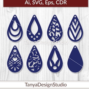 May include: A collection of eight navy blue teardrop-shaped earring designs. Each earring features a unique cutout pattern, including geometric shapes, floral motifs, and open designs. The image includes the text "Ai, SVG, Eps, CDR" and "TanyaDesignStudio".
